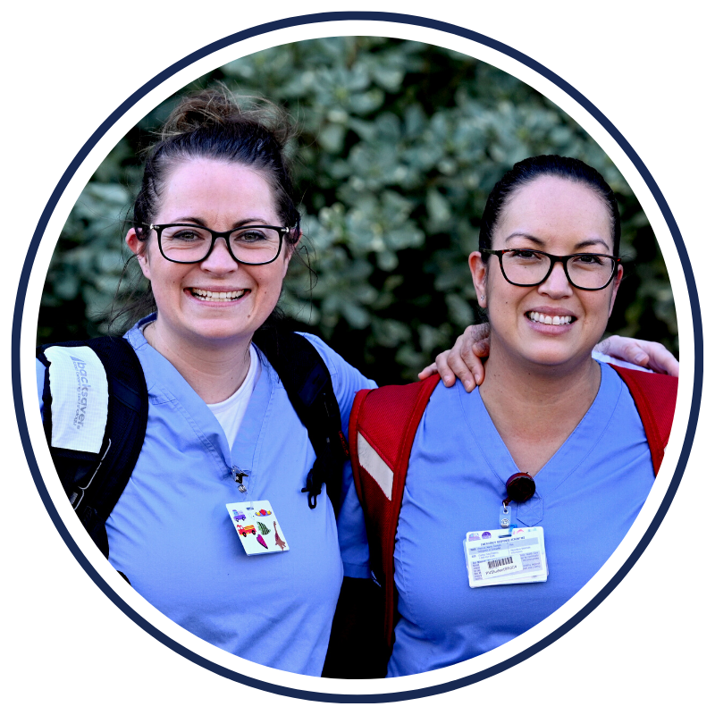 two nursing students smiling